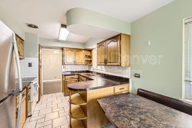 property at 8410 W 3rd Pl
