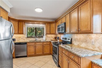 910 Vanderbilt Beach Rd in Naples, FL - Building Photo - Building Photo