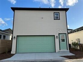 6553 Treehouse Ln in Magnolia Square, FL - Building Photo