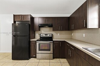 13 S Royal Poinciana Blvd in Miami Springs, FL - Building Photo - Building Photo