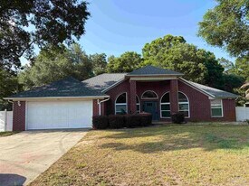 5614 Whispering Woods Dr in Pace, FL - Building Photo
