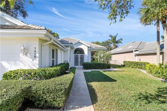 property at 7428 SE Waxberry Cir