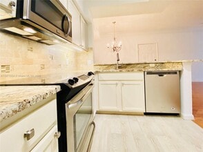 1103 Myrtlewood Cir E in Palm Beach Gardens, FL - Building Photo - Building Photo
