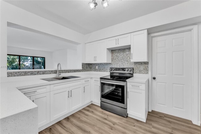 property at 3040 NW 96th St