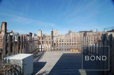 321 E 10th St in New York, NY - Building Photo - Building Photo