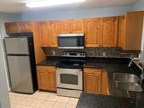 11295 W Atlantic Blvd in Coral Springs, FL - Building Photo - Building Photo