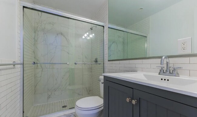 W. 127th St, St Nicholas Pl in New York, NY - Building Photo - Building Photo