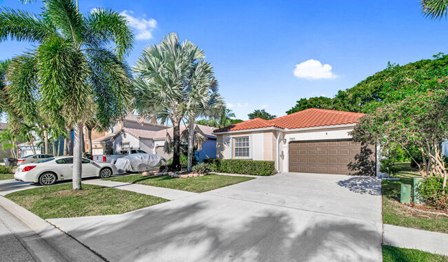 7469 Kingsley Ct in Greenacres, FL - Building Photo - Building Photo