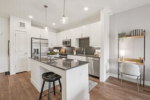 Alexan Pena Station in Denver, CO - Building Photo