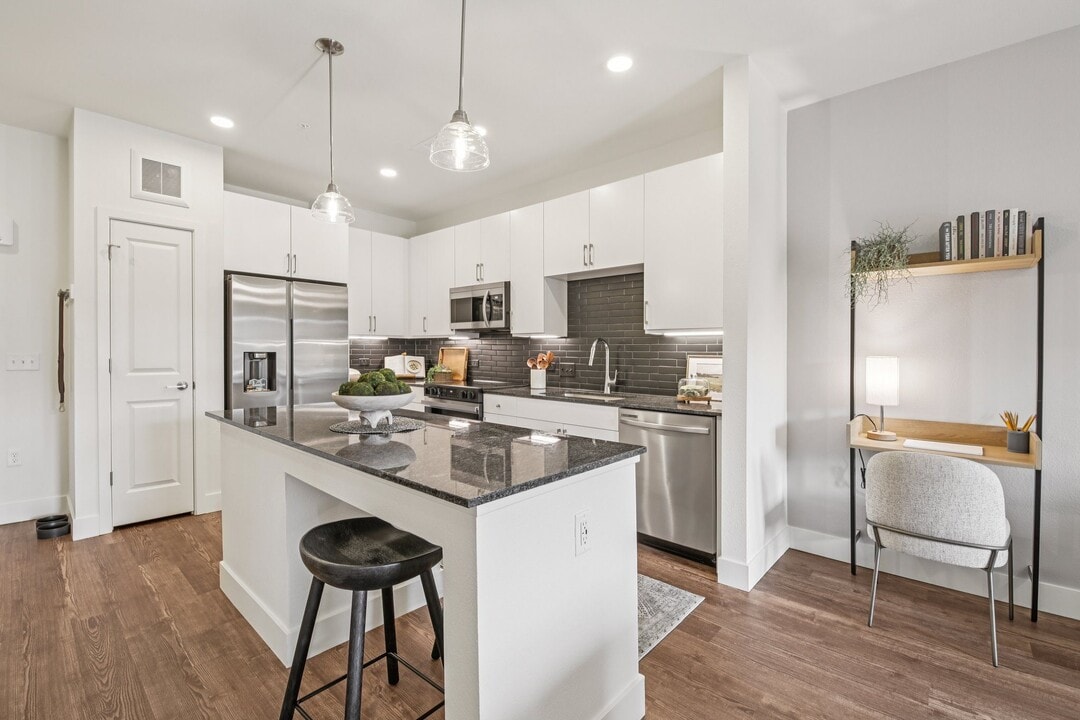 Alexan Pena Station in Denver, CO - Building Photo