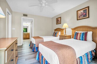 600 Neapolitan Way, Unit SI FL1-ID1073538P in Naples, FL - Building Photo - Building Photo
