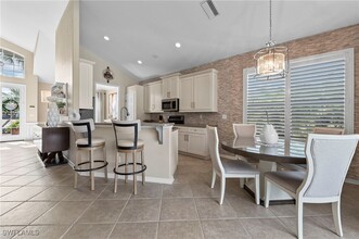 9921 Isola Way in Miromar Lakes, FL - Building Photo - Building Photo