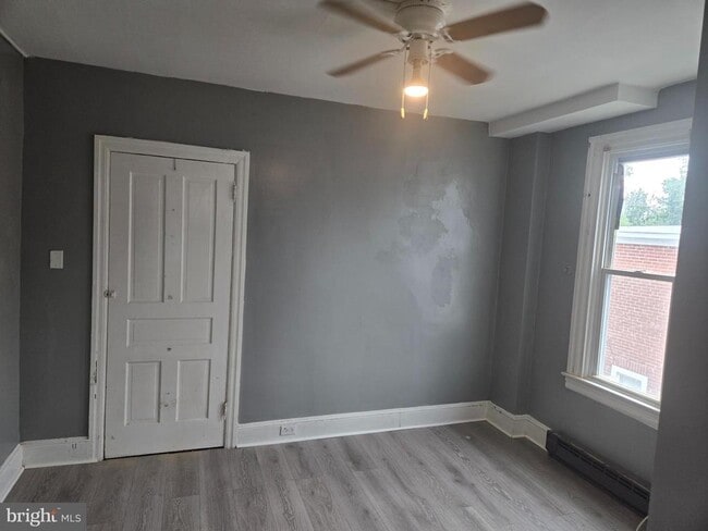 property at 105 W 24th St