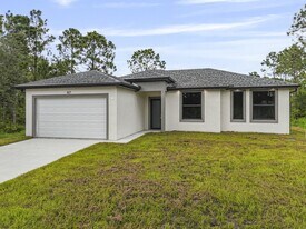 827 Carpenter St E in Lehigh Acres, FL - Building Photo