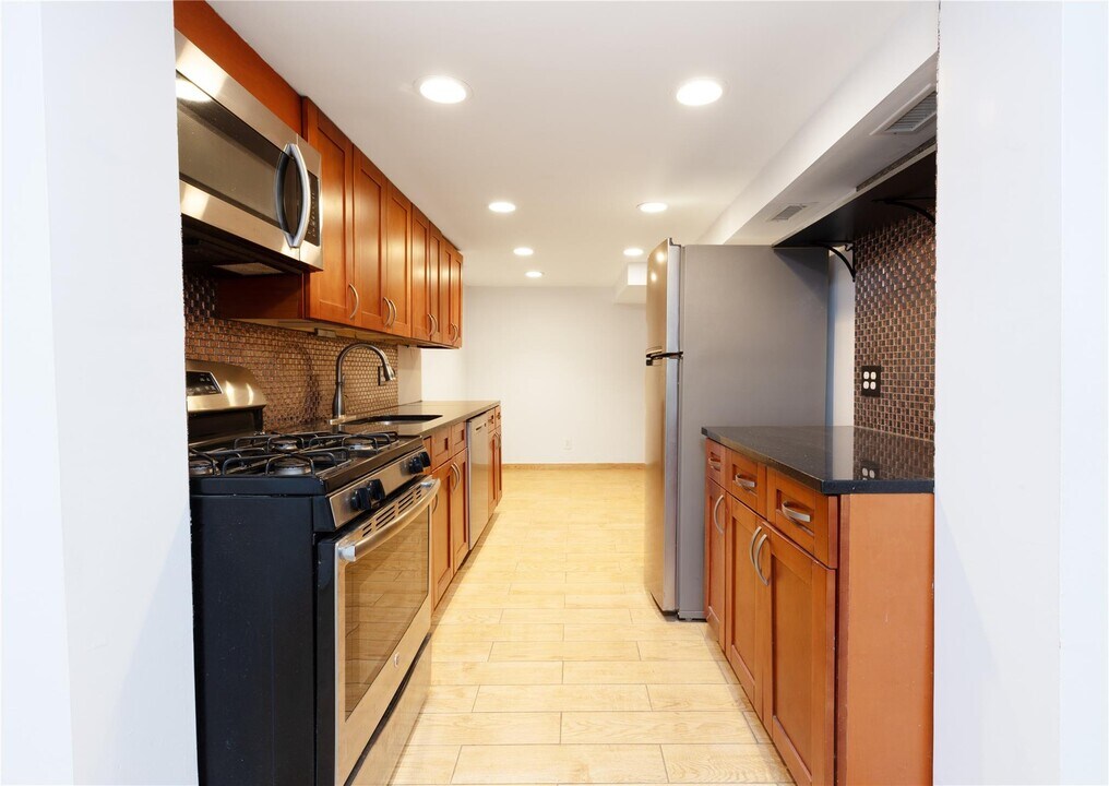 24-28-28 83rd St in Queens, NY - Building Photo