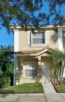 6975 Blacksmith Way in Greenacres, FL - Building Photo