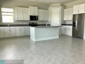 14046 Spruce Pne Dr in Westlake, FL - Building Photo - Building Photo