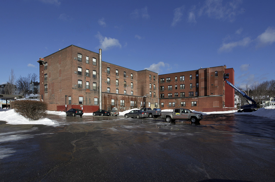 Hotel Raymond Apartments in Fitchburg, MA - Building Photo