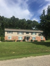 Village Court Apartments in Ortonville, MI - Building Photo - Building Photo