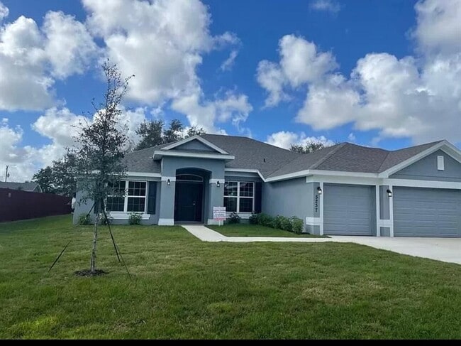 property at 5237 NW Reba Cir