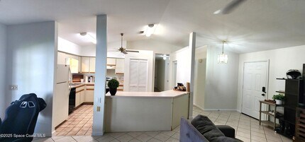 7746 Mango Grove Ave in Melbourne, FL - Building Photo - Building Photo