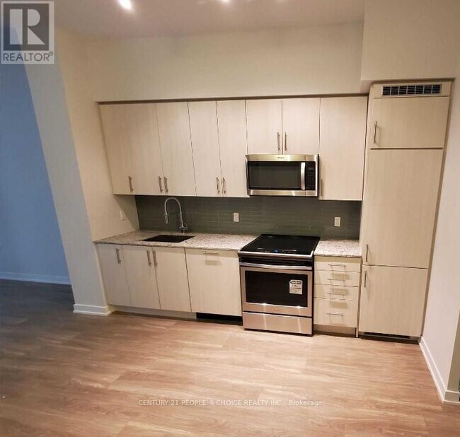 4055-4055 Parkside Village Dr in Mississauga, ON - Building Photo - Building Photo
