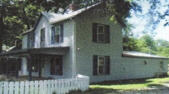 210 W 6th St in Lockwood, MO - Building Photo