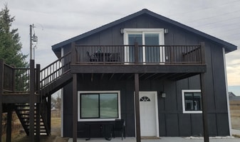 720 Farmall Ln, Unit 1 in Manhattan, MT - Building Photo