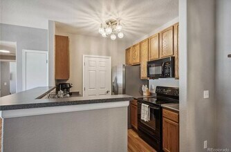 15700 E Jamison Dr, Unit #4303 in Englewood, CO - Building Photo - Building Photo