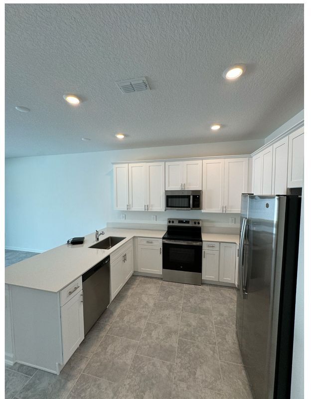 7717 Stone Crk Trl in Kissimmee, FL - Building Photo - Building Photo