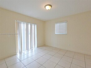 4908 Serafica Dr-Unit -8 in Lake Worth Beach, FL - Building Photo - Building Photo