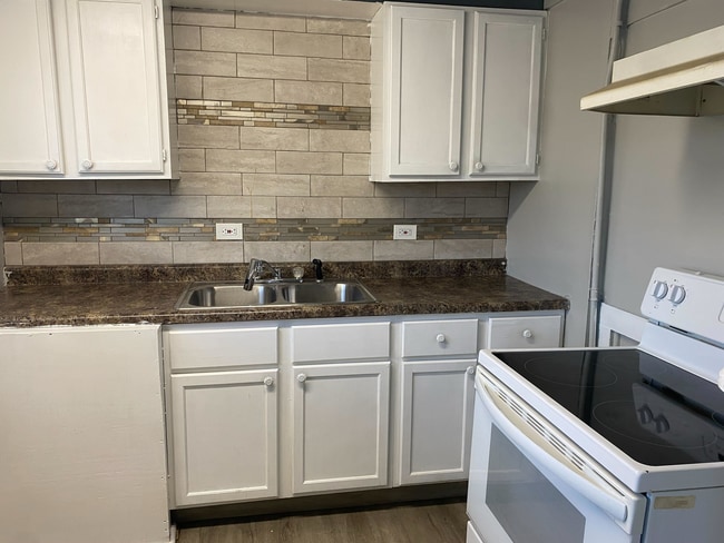 property at 203 W 154th St