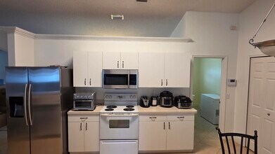 6448 NW Colgate St in Port St. Lucie, FL - Building Photo - Building Photo