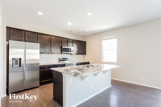 6433 N Ensenada Ct in Aurora, CO - Building Photo - Building Photo
