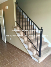 411 S Darrowby Dr in Raymore, MO - Building Photo - Building Photo