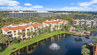 100 Uno Lago Dr, Unit 404 in Juno Beach, FL - Building Photo - Building Photo