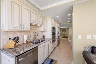 9425 Blind Pass Rd, Unit 408 in St Pete Beach, FL - Building Photo - Building Photo