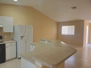 1114 Harry Ave S in Lehigh Acres, FL - Building Photo - Building Photo