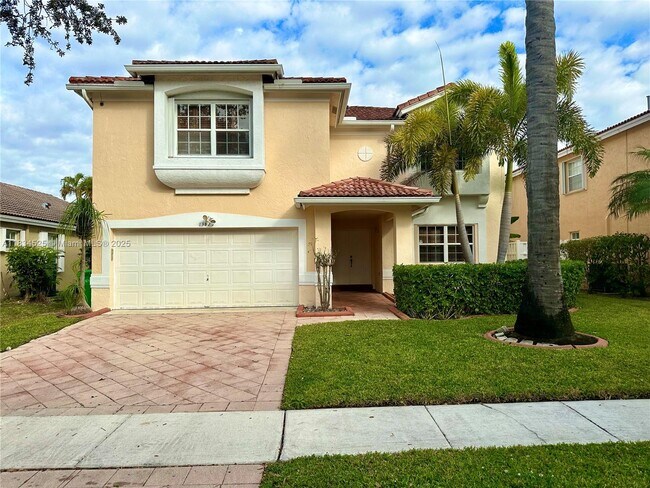 property at 13825 NW 22nd St