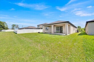 8755 Rindge Rd in Polk City, FL - Building Photo - Building Photo