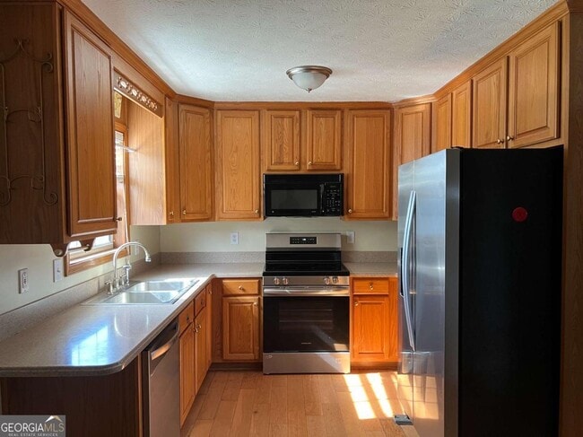 5075 Mills Dr in Cumming, GA - Building Photo - Building Photo