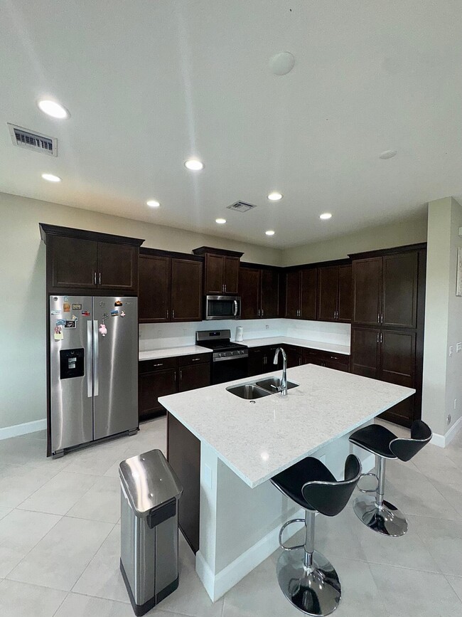 5530 Macoon Wy in Westlake, FL - Building Photo - Building Photo
