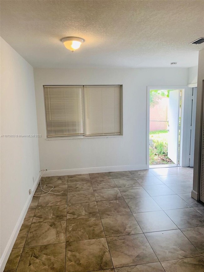 property at 4240 NW 12th Ave