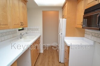 6877 Countrywoods Cir in Midvale, UT - Building Photo - Building Photo