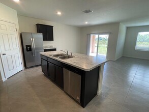 2446 SW Savage Blvd in Port St. Lucie, FL - Building Photo - Building Photo