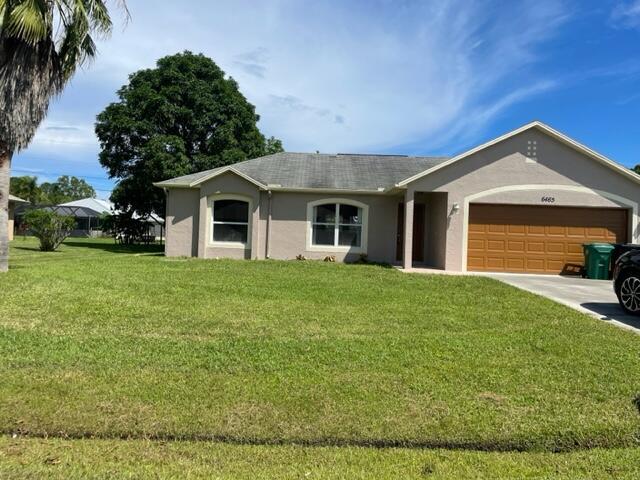 6465 NW Friendly Cir in Port St. Lucie, FL - Building Photo - Building Photo