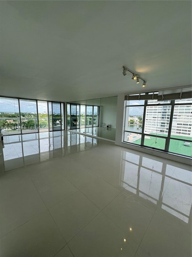 property at 5750 Collins Ave