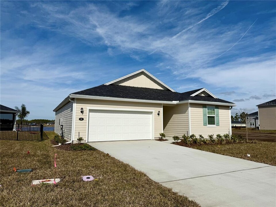 14 Tea Olive Dr in Palm Coast, FL - Building Photo