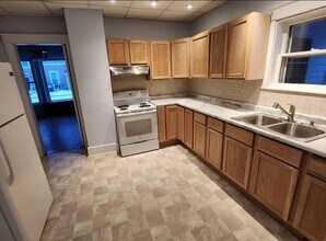 563 W 4th St, Unit First Floor in New Richmond, WI - Building Photo - Building Photo