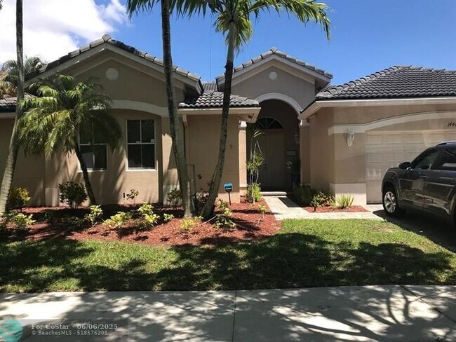 1441 Cardinal Way in Weston, FL - Foto de edificio - Building Photo